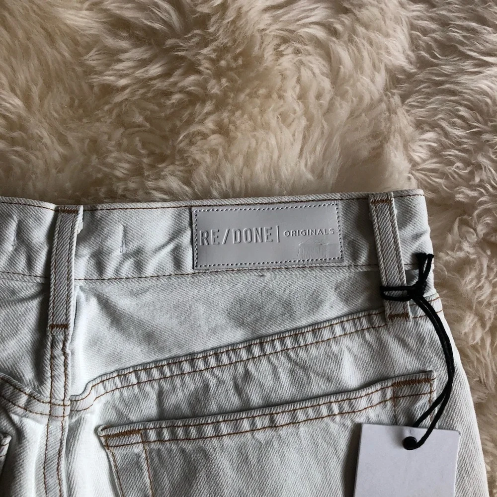 Re/Done The 80’s Long Short Raw Hem Bleach White Denim 25
